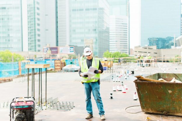 construction worker wearing safety gear on a construction site